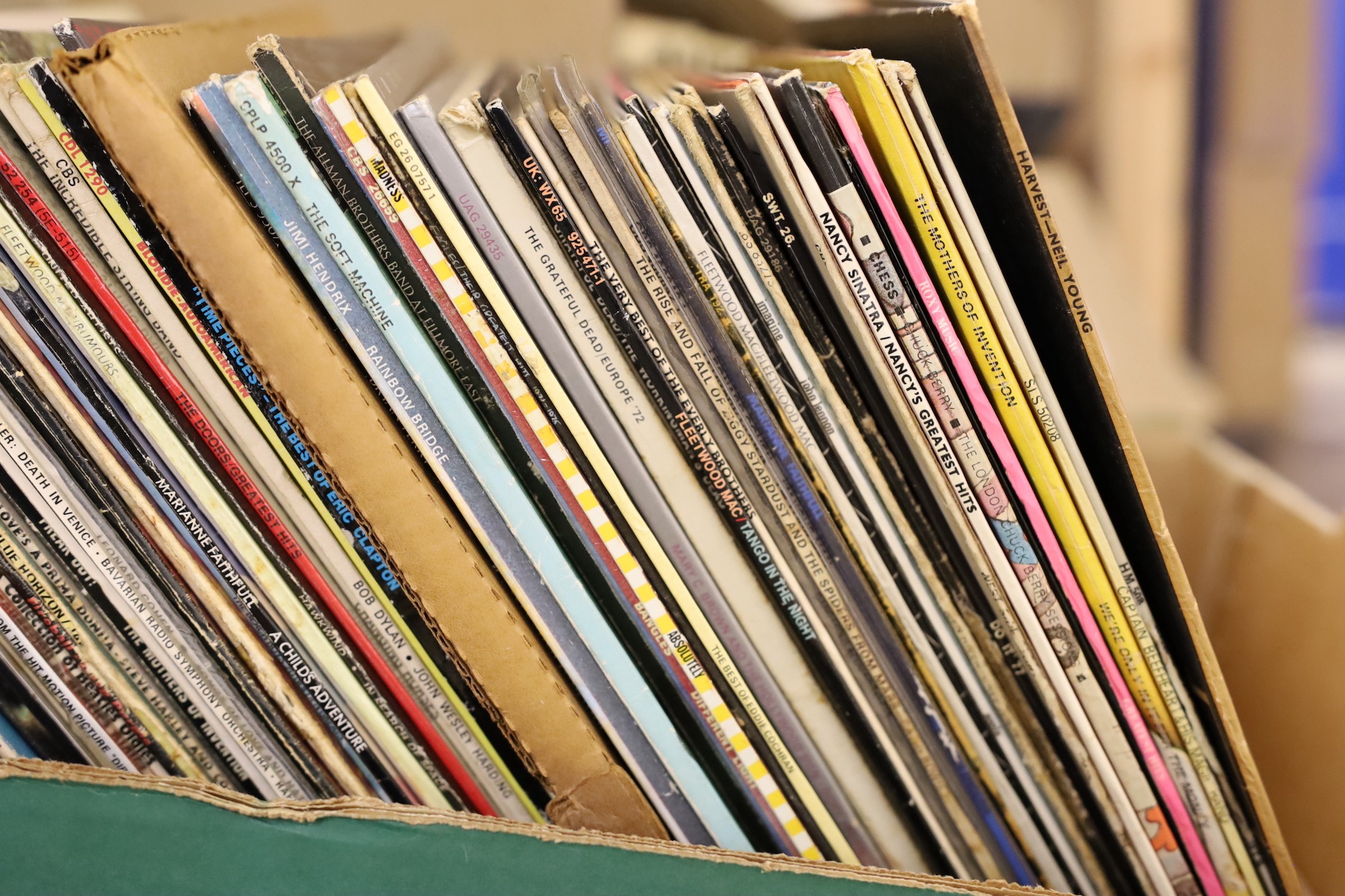 A quantity of various records including Neil Young, Creedence Clearwater, David Bowie, Fleetwood Mac, Eddie Cochran, Leonard Cohen, Alice Cooper, The Rolling Stones, Bob Dylan etc.